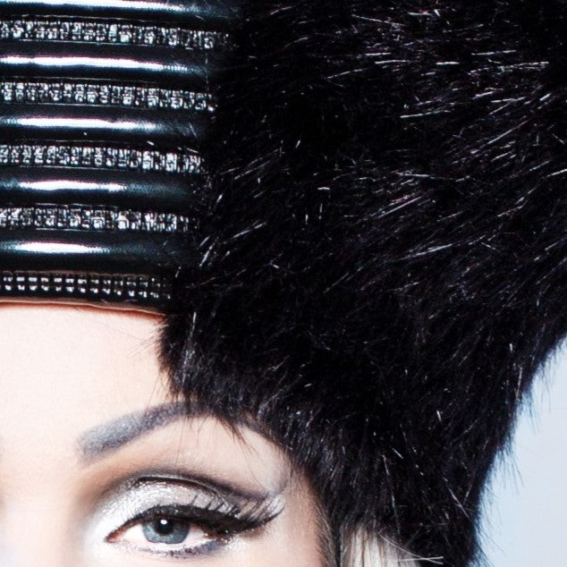 Zar Hat – black faux fur with ribbed patent leather accent, close-up detail view