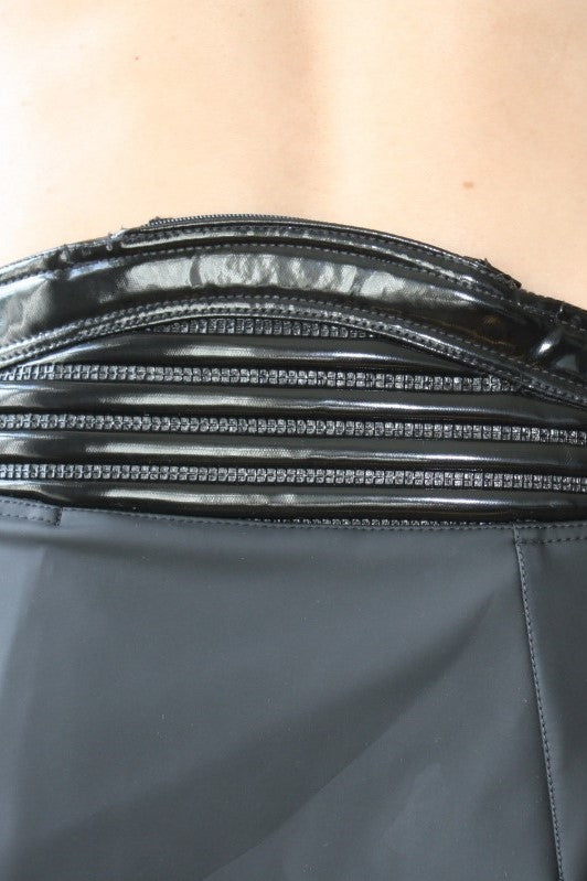Kilt – glossy black patent waistband with rhinestone detail trim and stitching, close-up