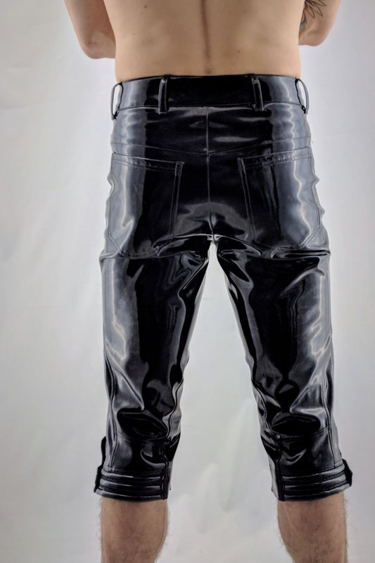 Knigger – glossy black PVC capri pants with transparent side panels, back view