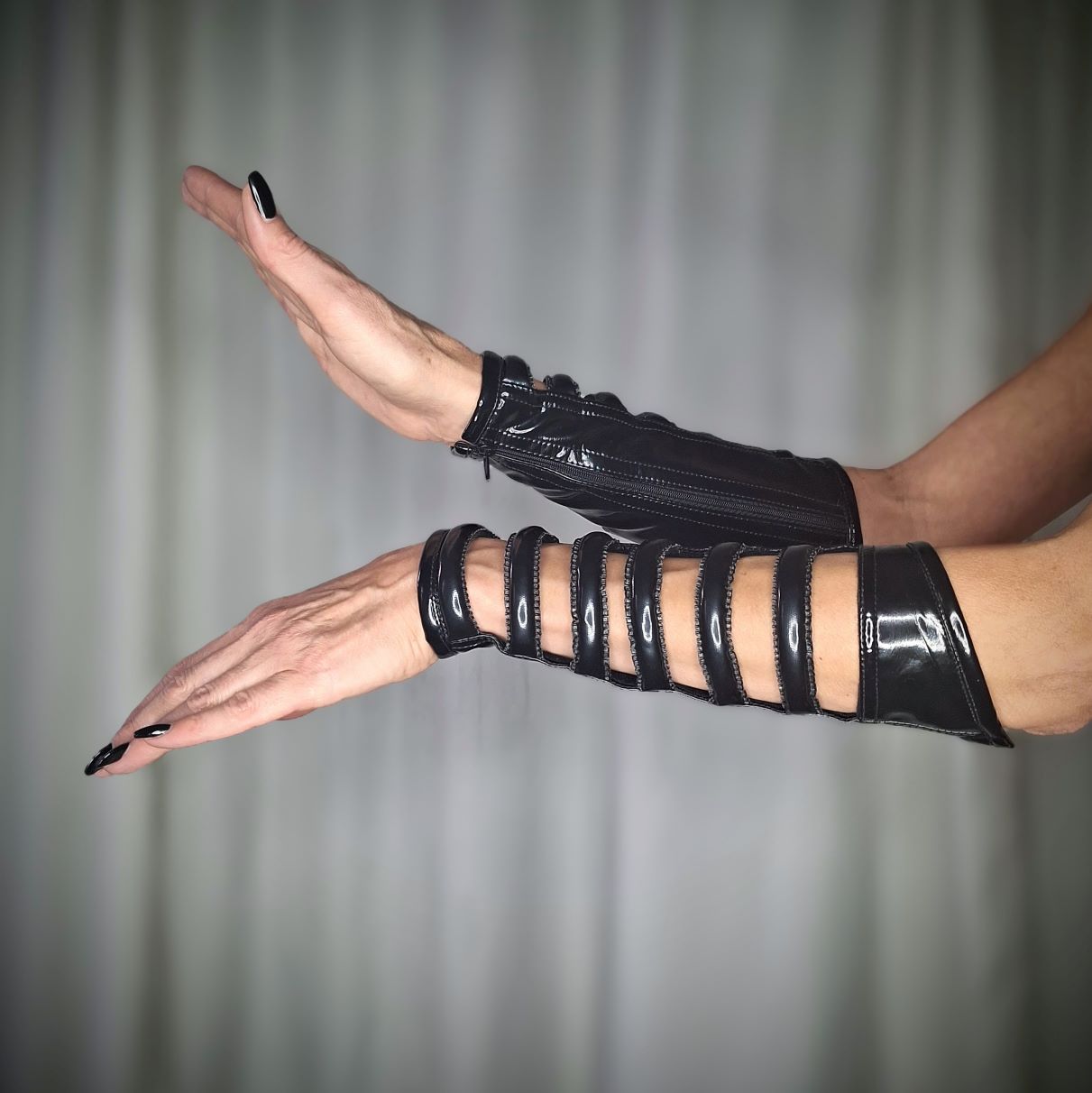 Andromy glove - glossy black PVC gauntlet with multi-strap cut-out detail and wrist cuff, detail view