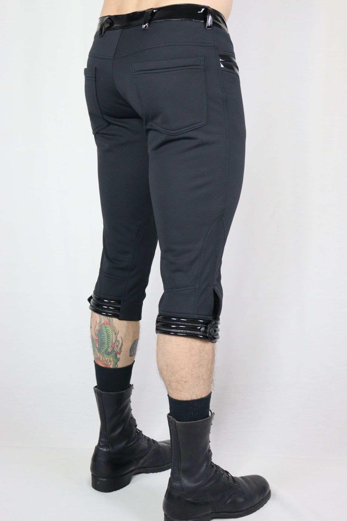 Knigger Softshell - black softshell capris with glossy patent waistband and cuffs, back view