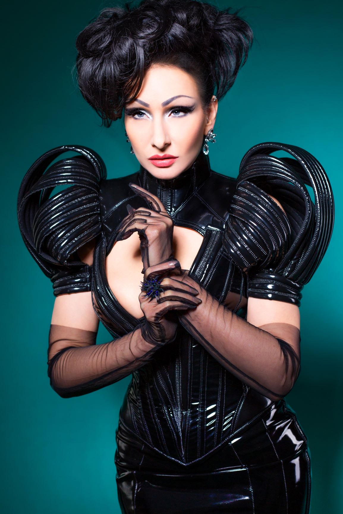 Mag dress - glossy black PVC corset with exaggerated striped padded shoulders, front view