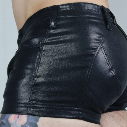 Masculinum Hot Pant – shiny leatherette shorts with ribbed panel detail and fitted waist, side angle