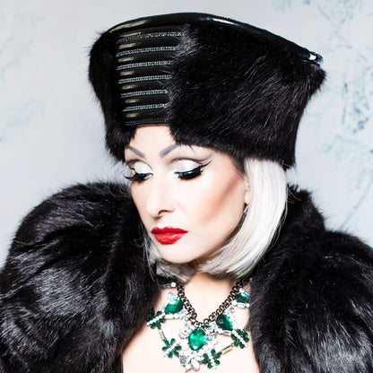Zar Hat – black faux fur with leather accent band and rhinestone details, front view