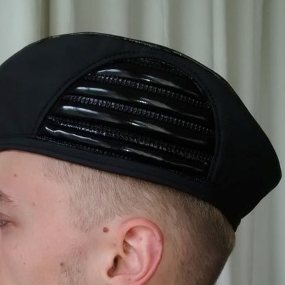 Baret – black PVC beret with glossy finish and ventilation ribs, top detail view