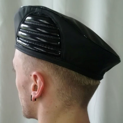 Baret – glossy black PVC beret with horizontal ventilation ribs, side view