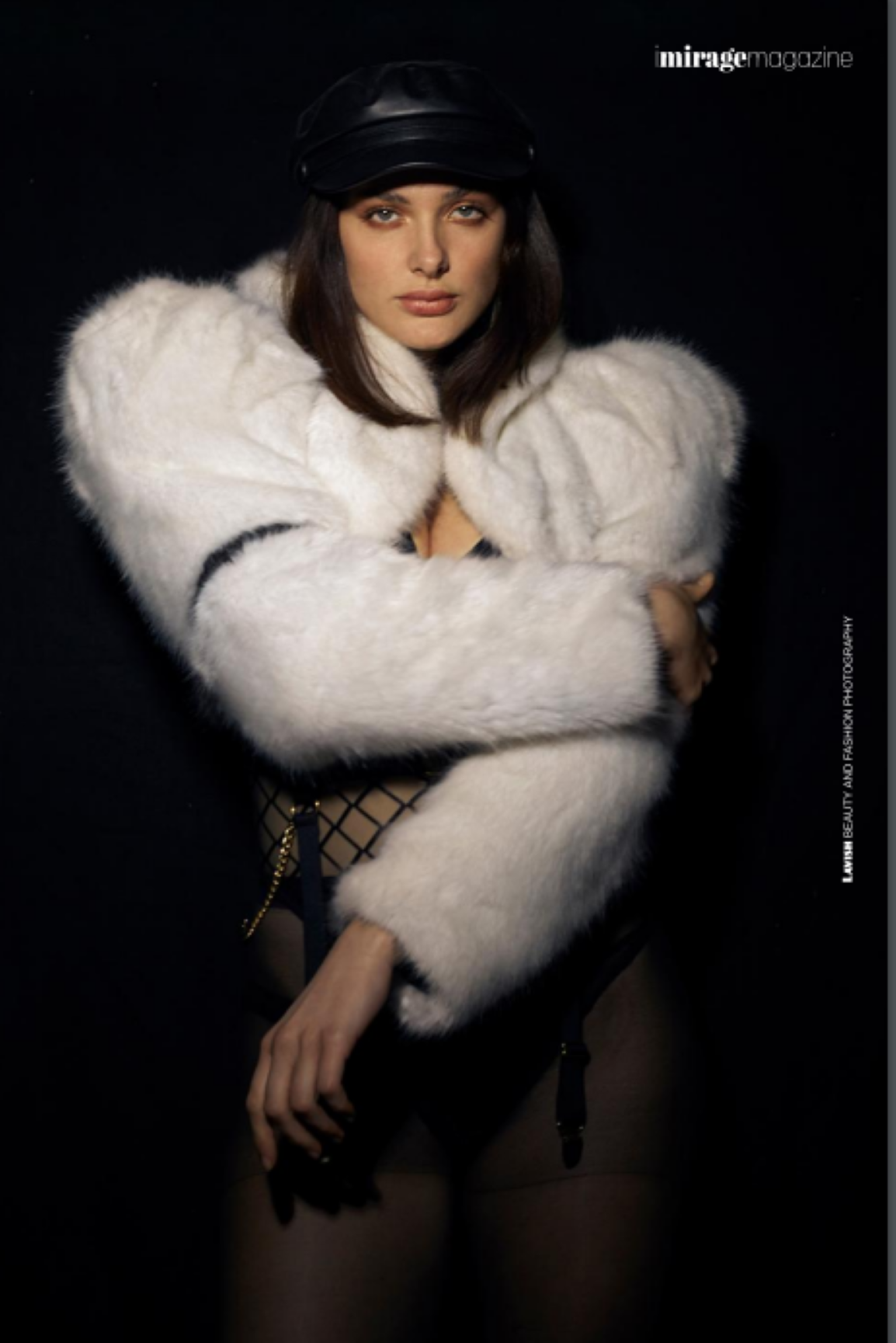 Bolera – white faux fur wrap stole with black belt buckle accent detail, front three-quarter view