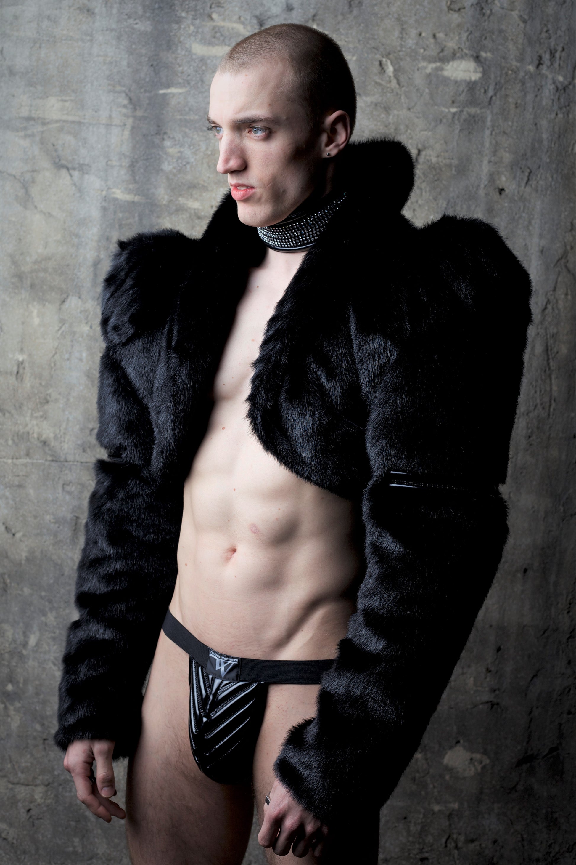 Bolero Fake Fur – black faux fur cropped bolero with structured sleeves, side profile