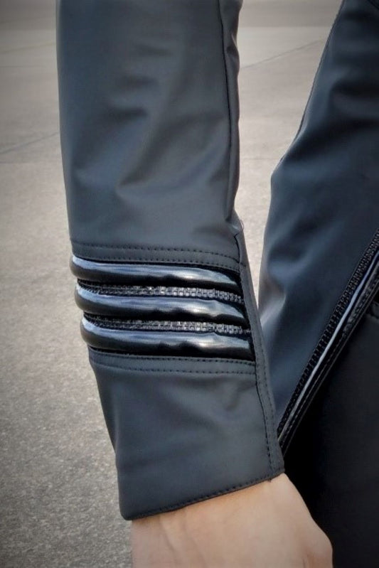 Dandy Jacket matte - matte black PVC sleeve with striped trim detail, close-up