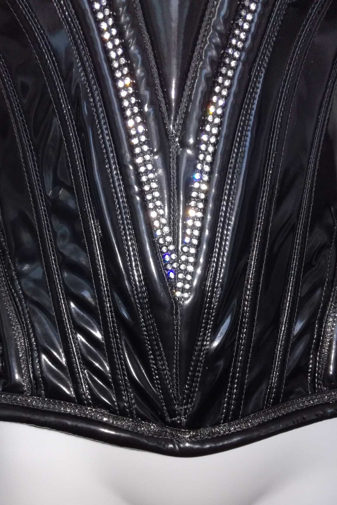 Galactica Corsage DK – dual rhinestone trim on front seaming, extreme close-up