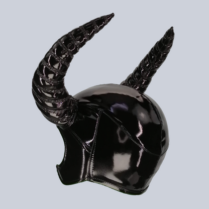 Ibex - glossy black patent helmet with sculpted horns and ribbed texture, front view