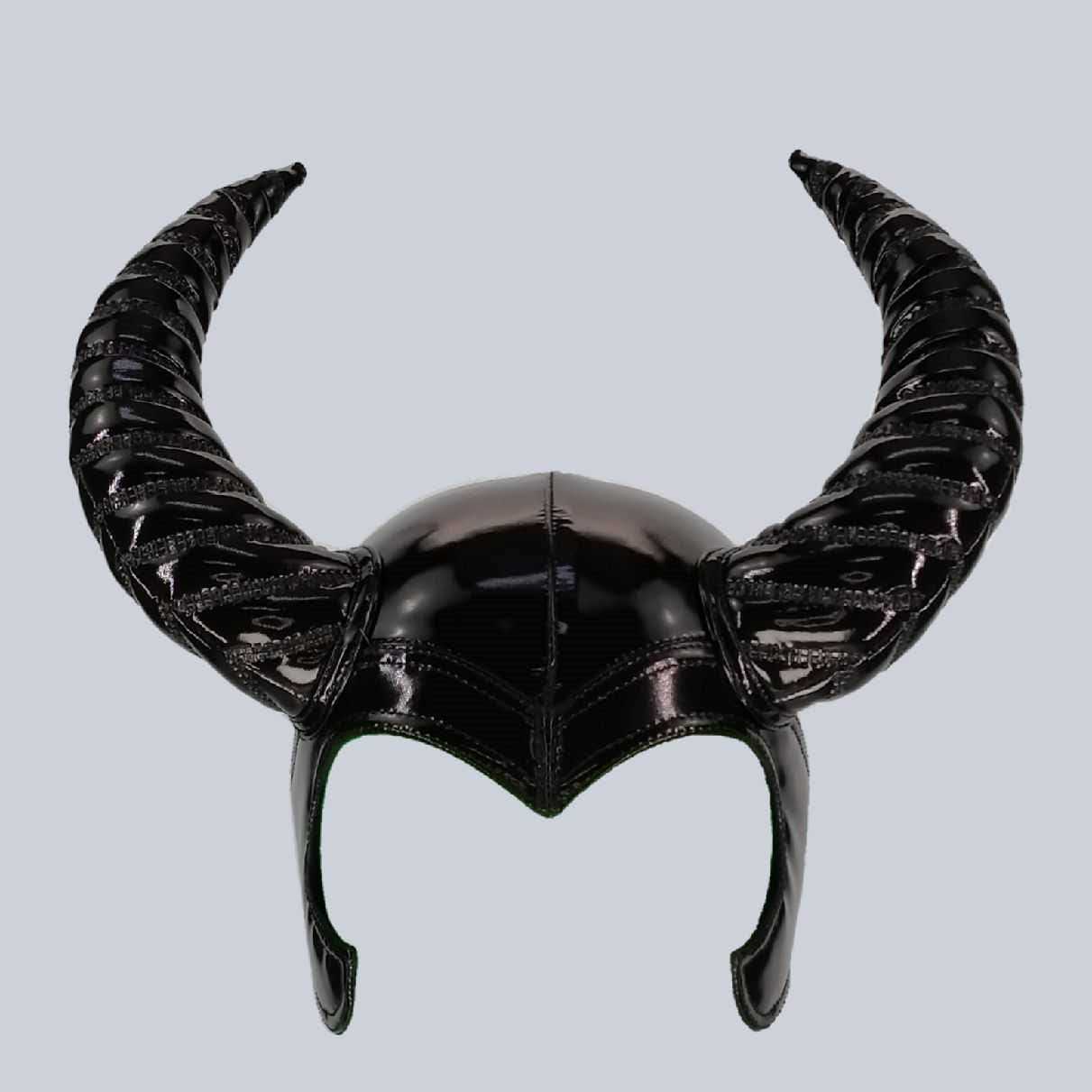Ibex - glossy black patent helmet with elongated spiral-ribbed horns and chin strap, top view