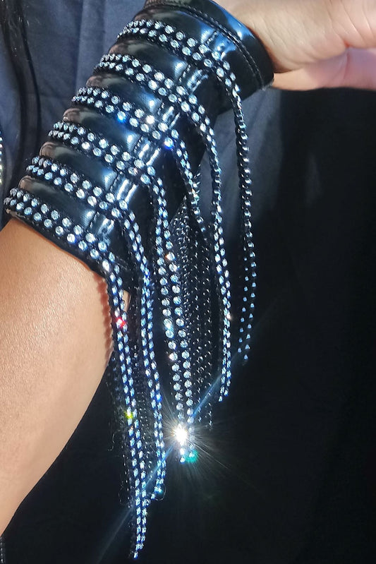 Star Trail – black vegan leather cuff with rhinestone chain fringe, on-body wrist detail