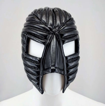 Warrior Mask – glossy black PVC with radiating horizontal ribs and eye openings, front