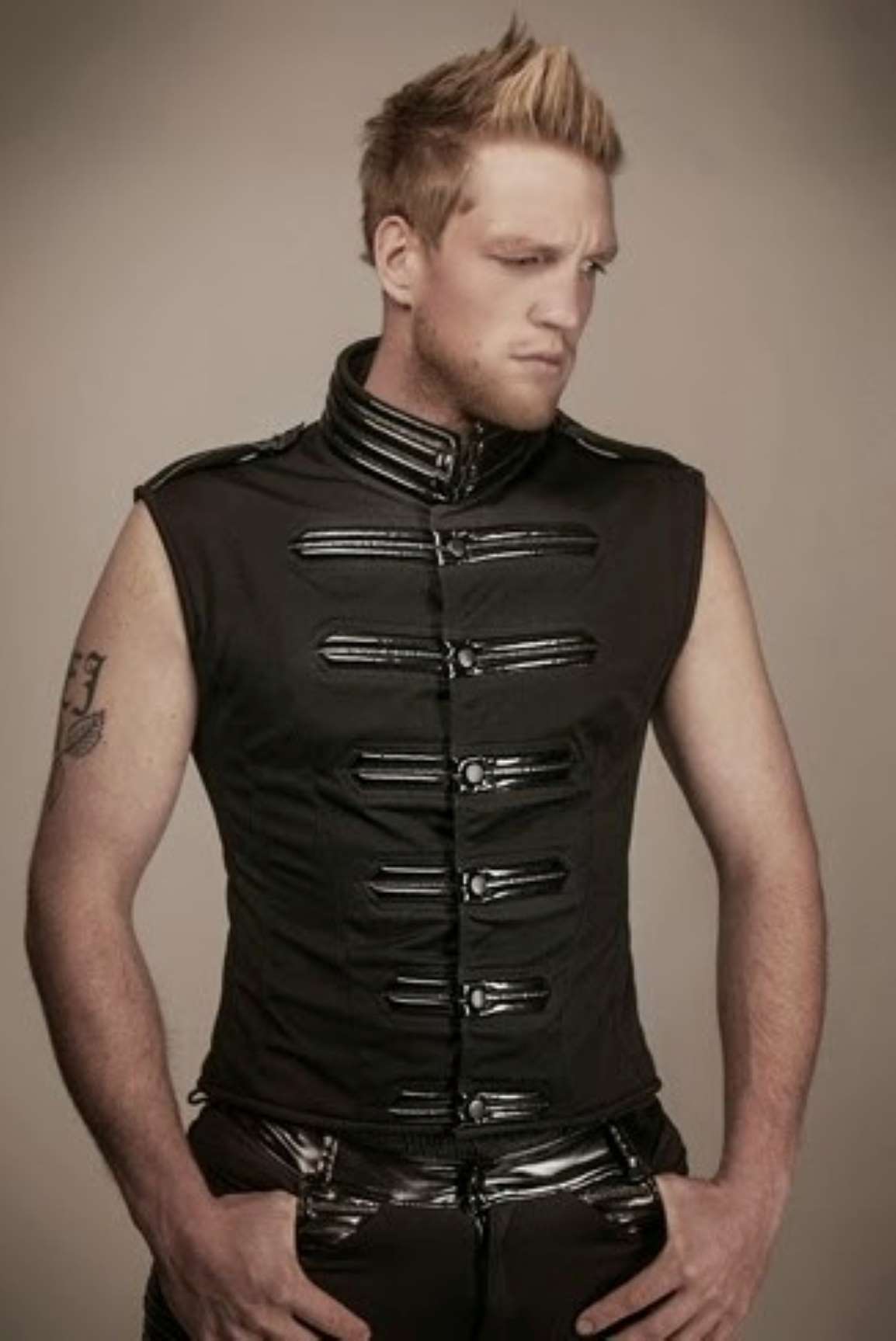 Military Top Softshell - sleeveless black softshell with metal buckle strap closure, front view
