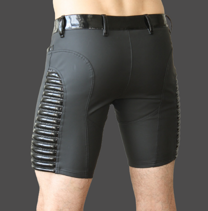 Dandy Pant Short – black glossy softshell shorts with silver ribbed outer thigh detail, front view